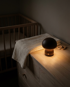 Zivol Grove lamp on a nursery dresser at night