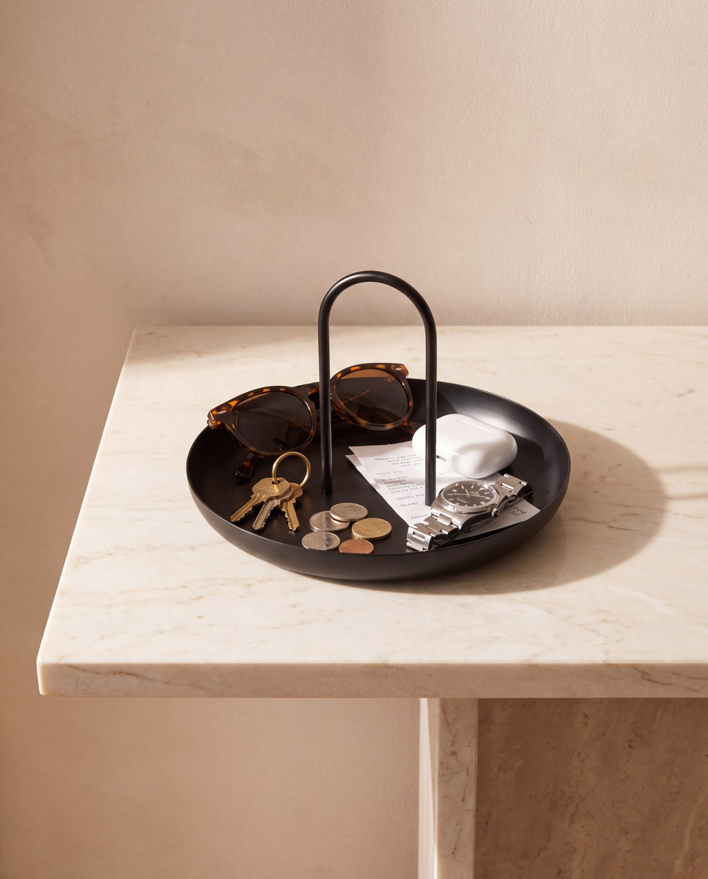 The same objects on the same console, now gathered inside the Zivol Arc tray