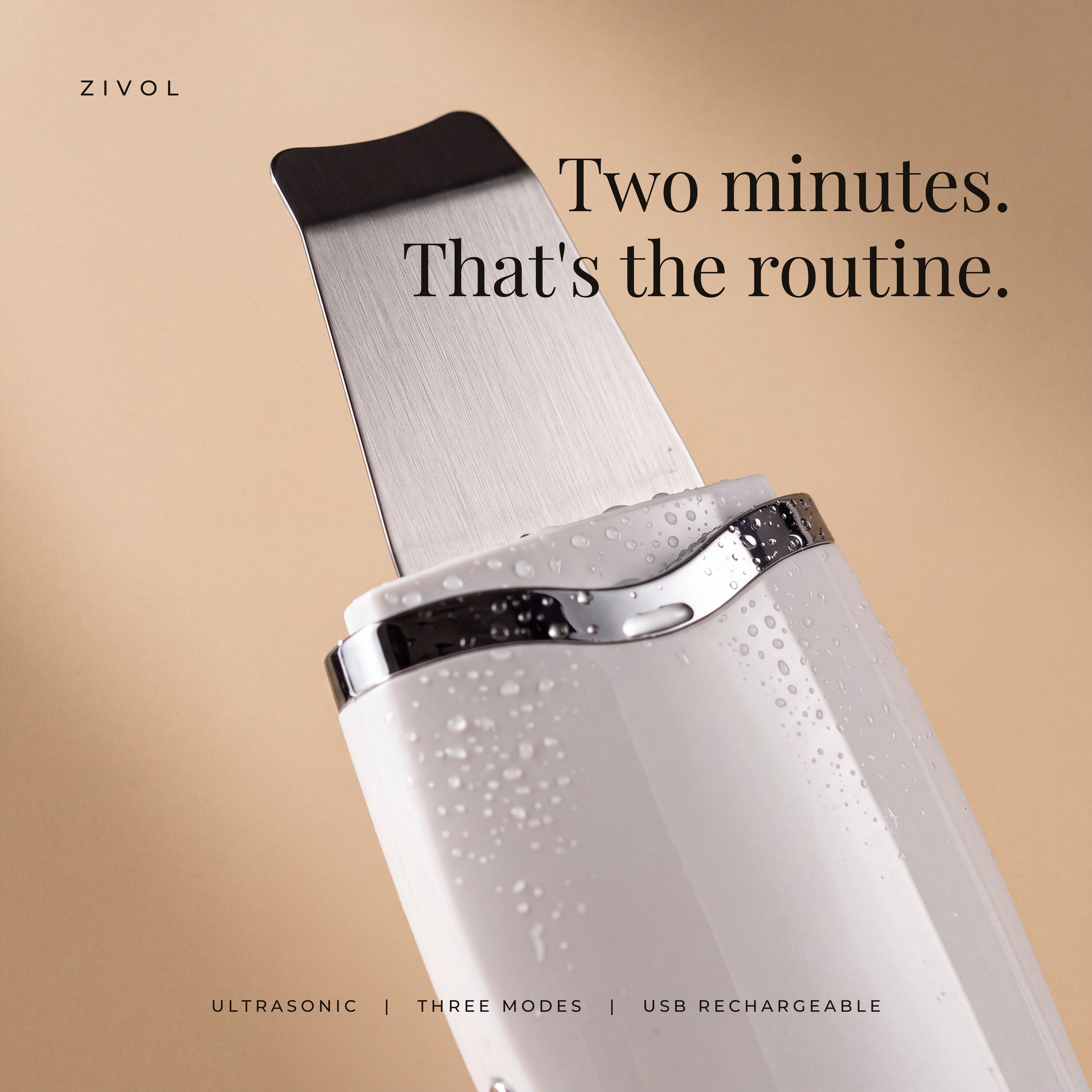 Zivol Glide stainless steel spatula head close-up with water droplets