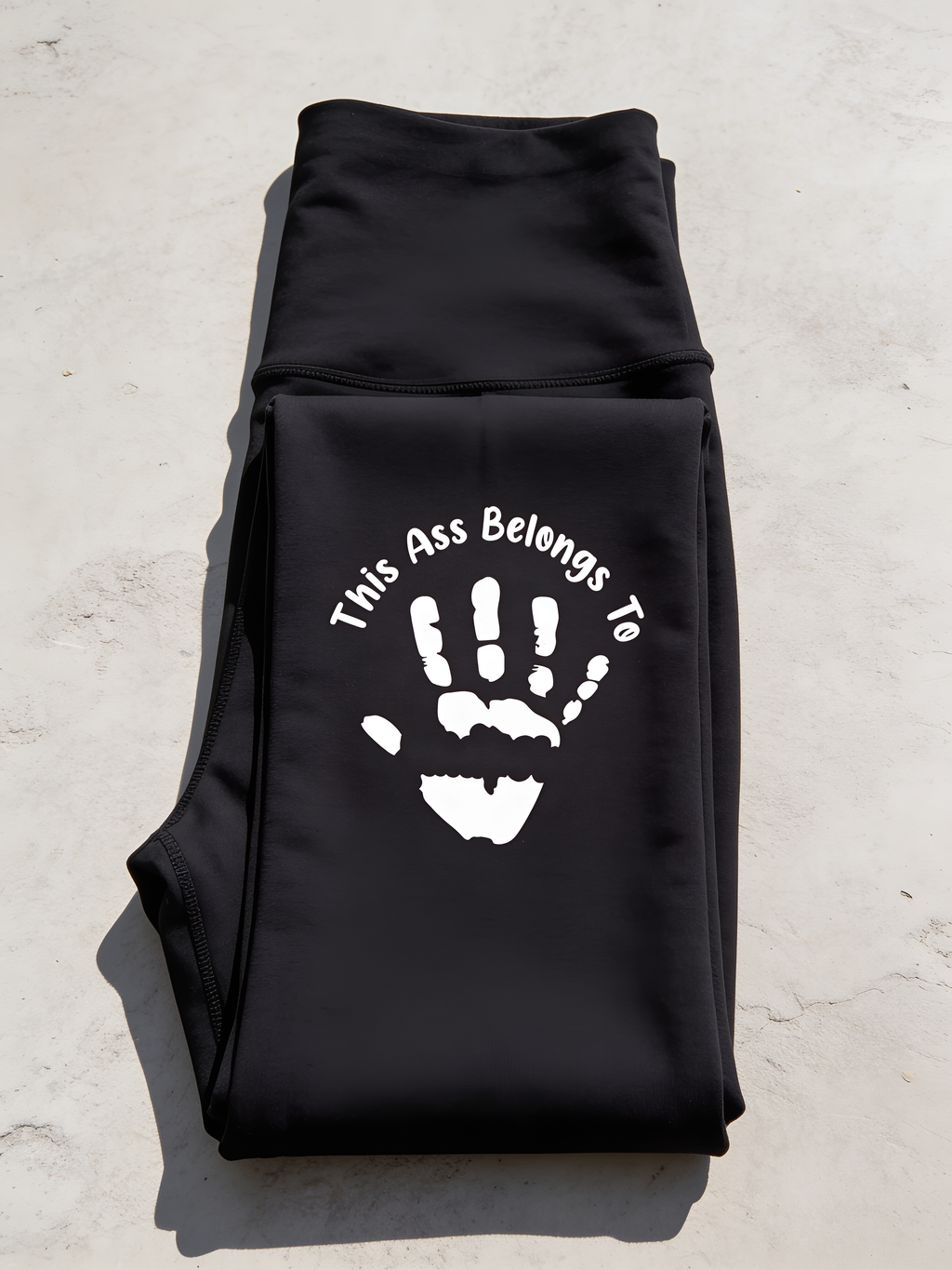 Handprint print shown flat and undistorted on black leggings