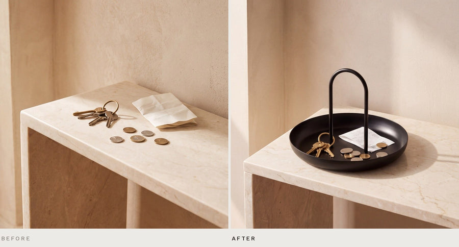 The same entryway console before and after: keys, coins and a receipt loose, then gathered in the round black Arc tray