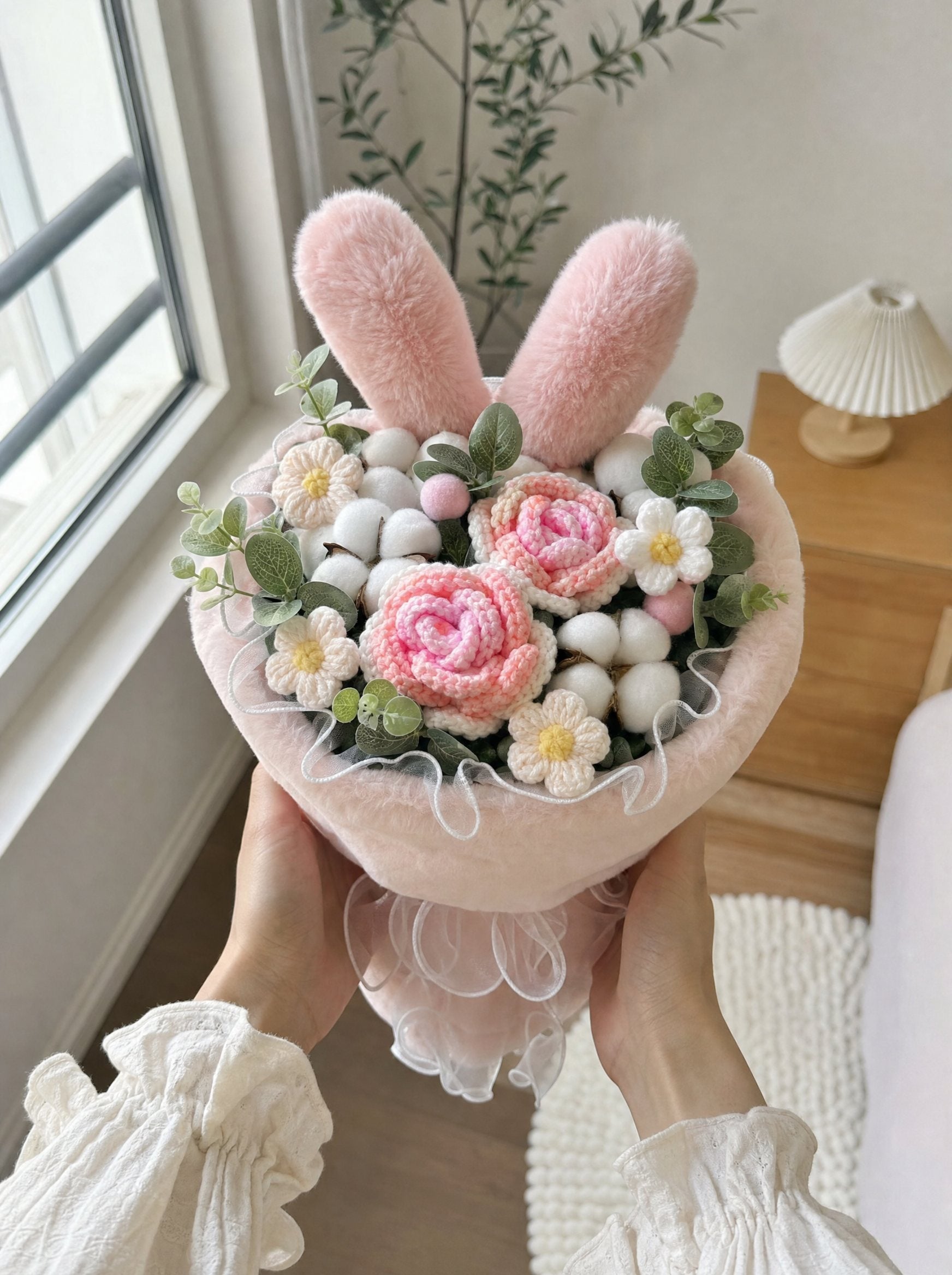 Zivol Bloom pink bouquet held in hands